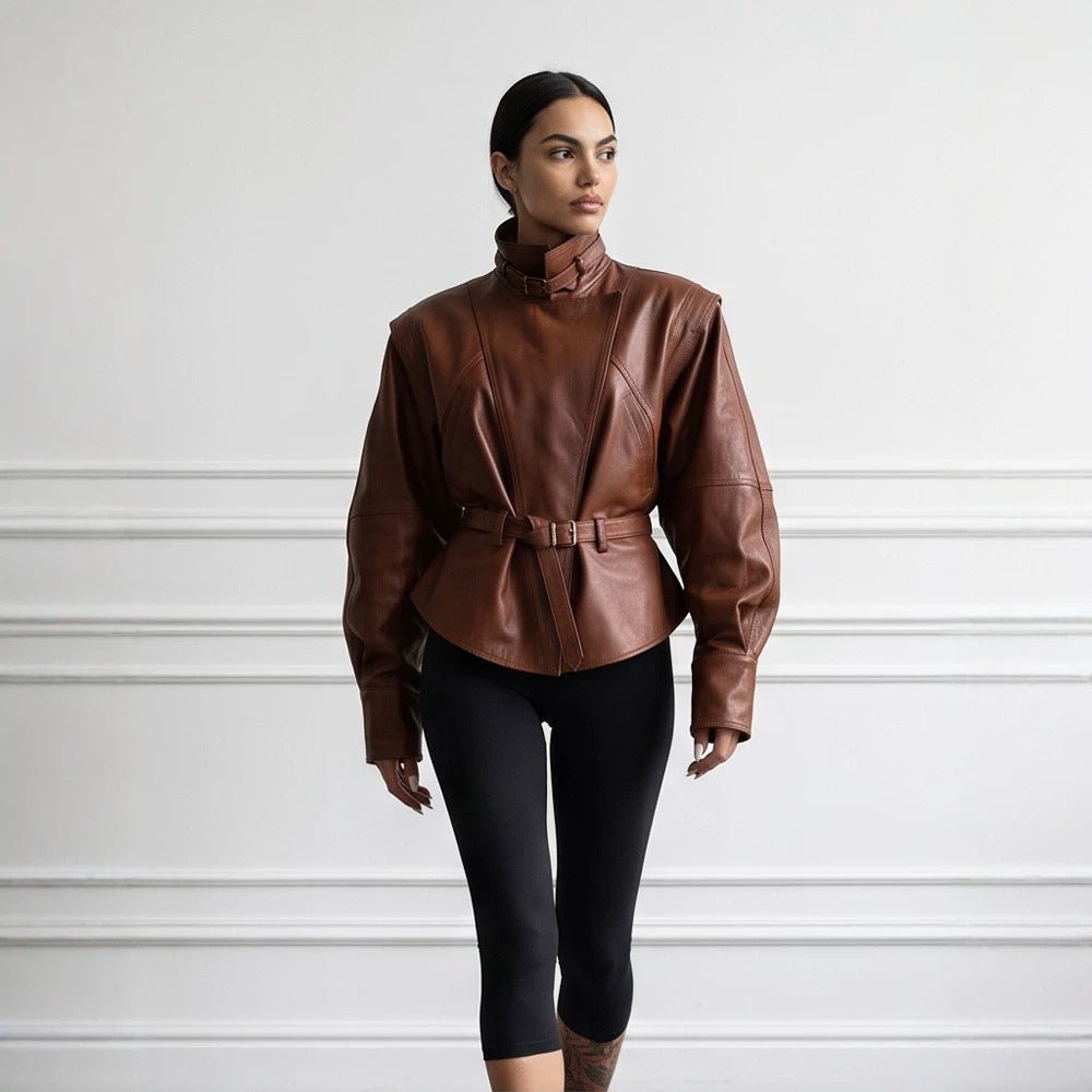 Women's tailored faux leather jacket with standing collar, neck strap, and figure-shaping waist belt Chichicherry - Chichicherry
