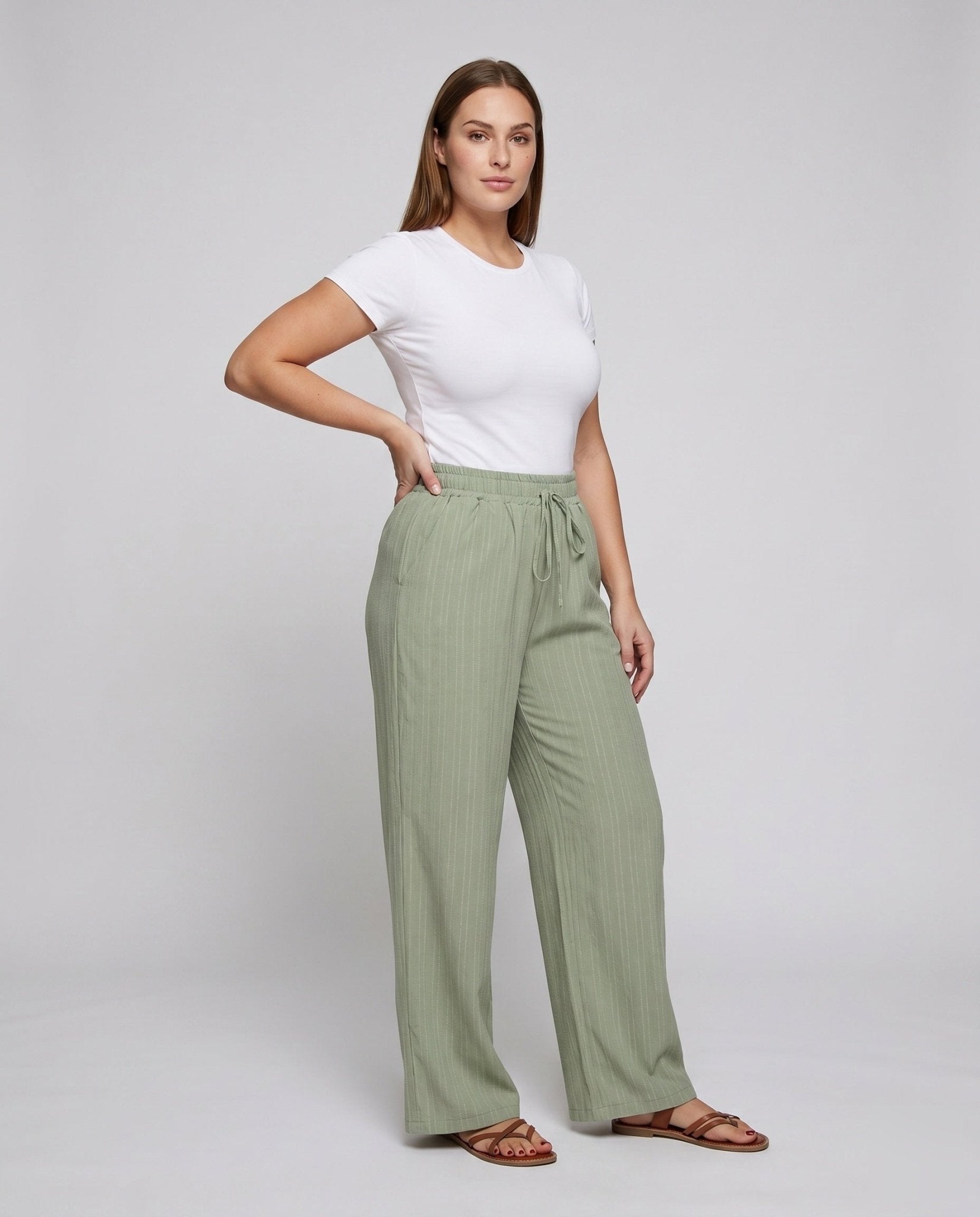 Women's wide palazzo pants with elastic waistband and stylish striped design - Chichicherry